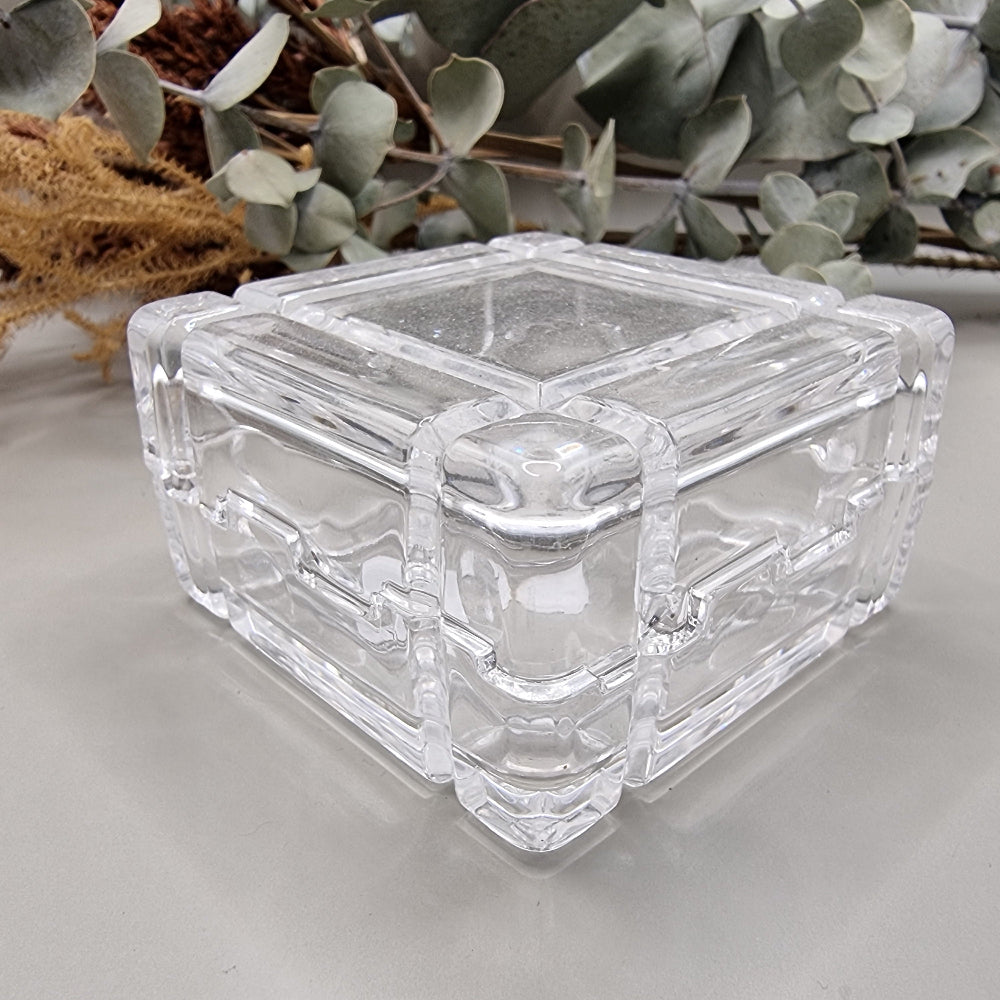 Vintage square bevelled glass trinket box with geometric design.