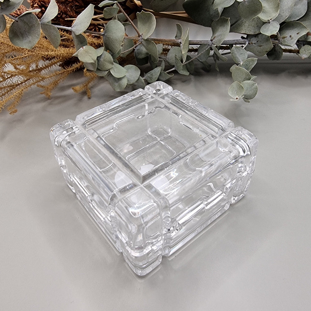 Vintage square bevelled glass trinket box with geometric design.