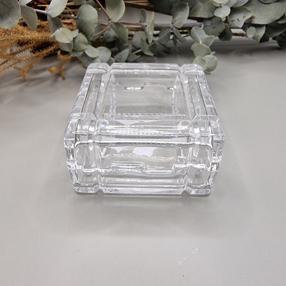 Vintage square bevelled glass trinket box with geometric design.