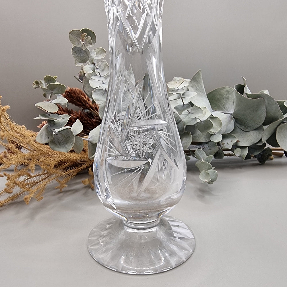 Cut crystal bud vase with flared top and starburst pattern