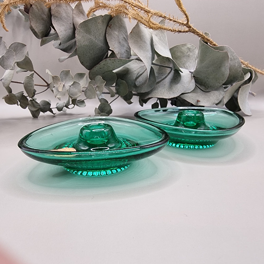 Pair of Bohemia emerald green glass candle holders made in Czechoslovakia with dish design.