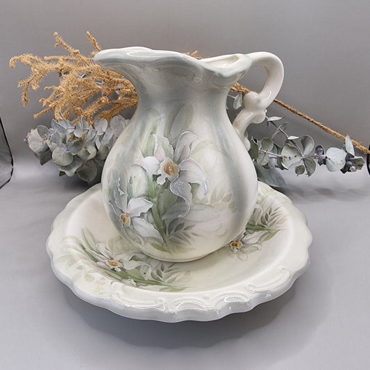 Vintage creamer & saucer with hand-painted flowers