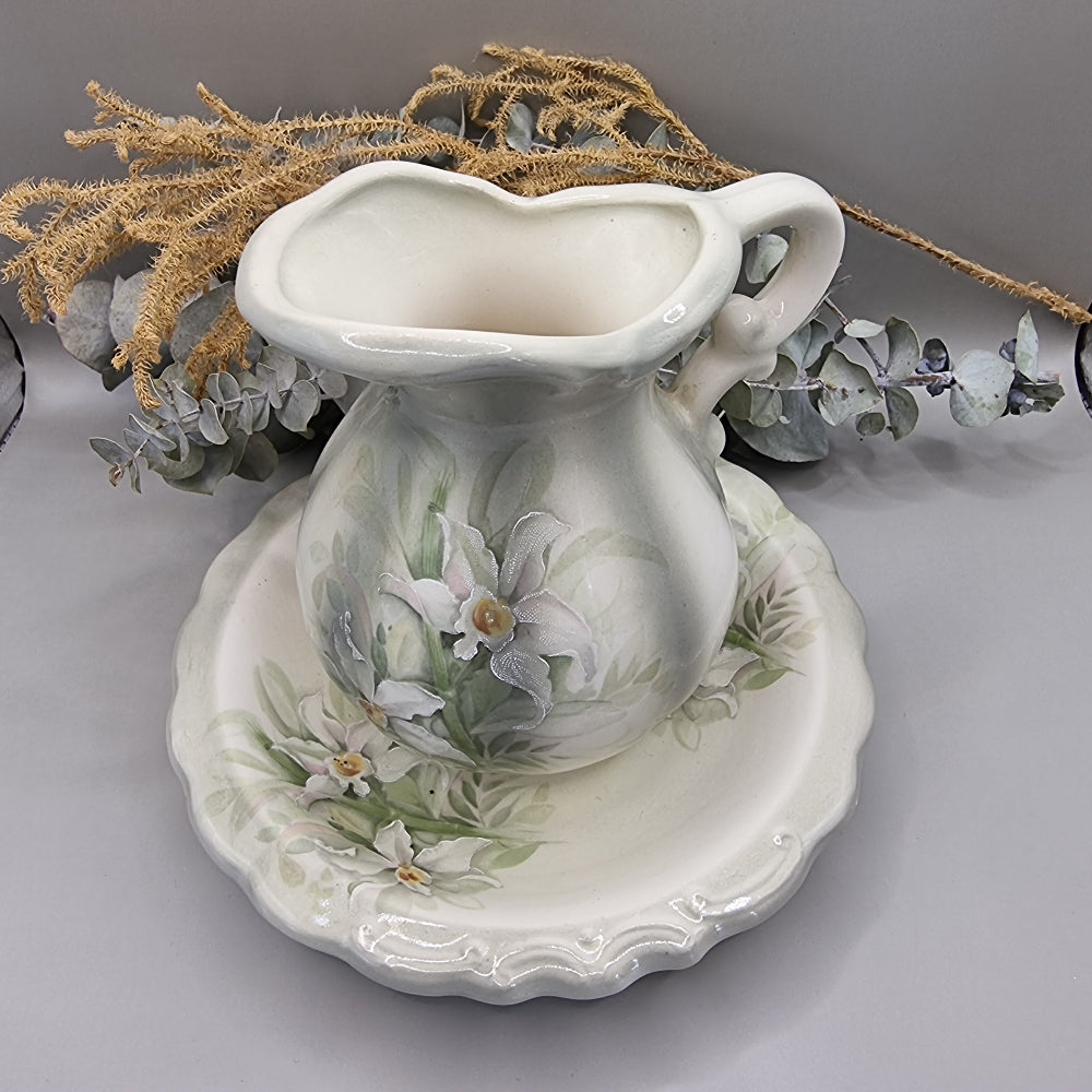 Vintage creamer & saucer with hand-painted flowers