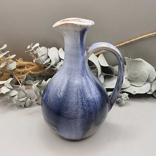 Pottery pitcher or vase with blue glaze