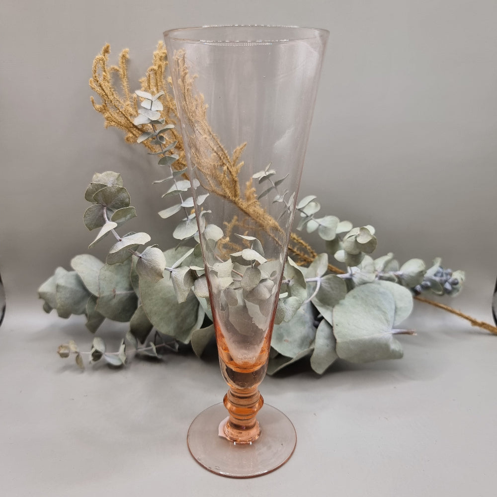 Tall pink glass or vase