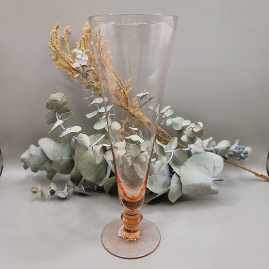 Tall pink glass or vase