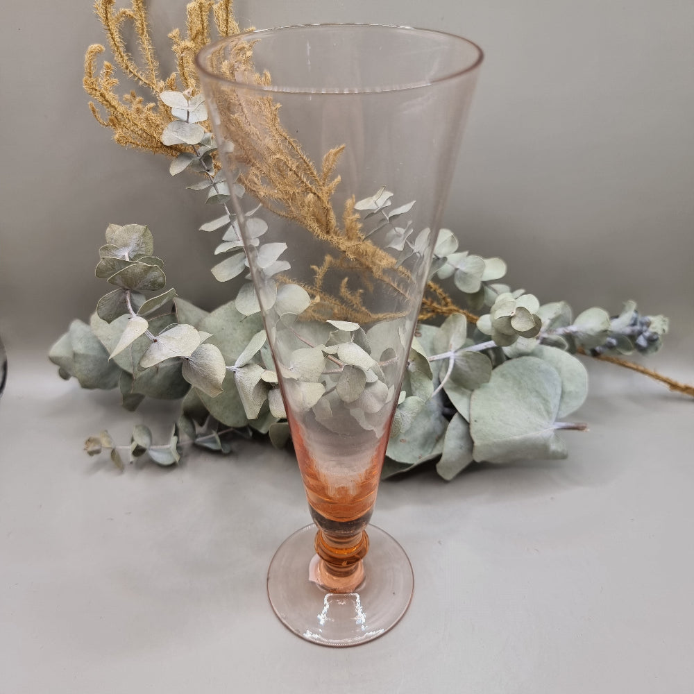 Tall pink glass or vase