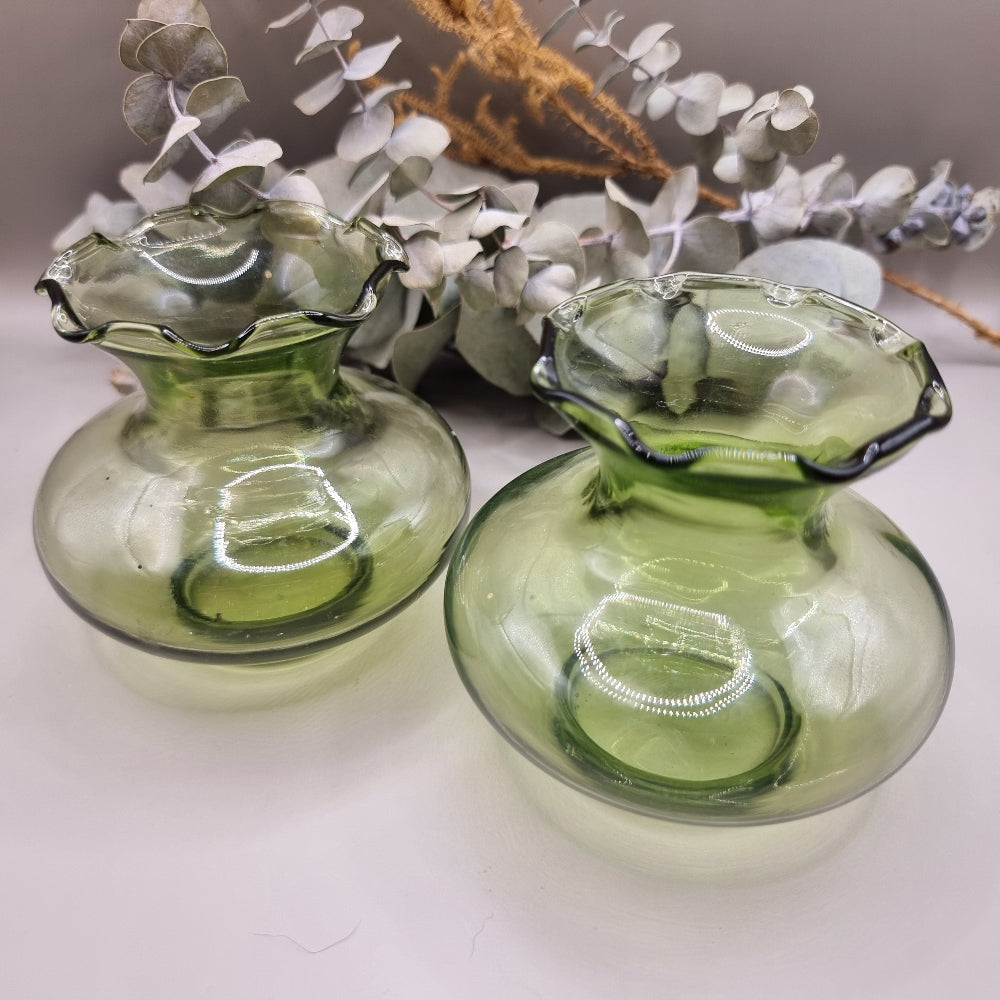 Pair of vintage green glass vases with fluted rim