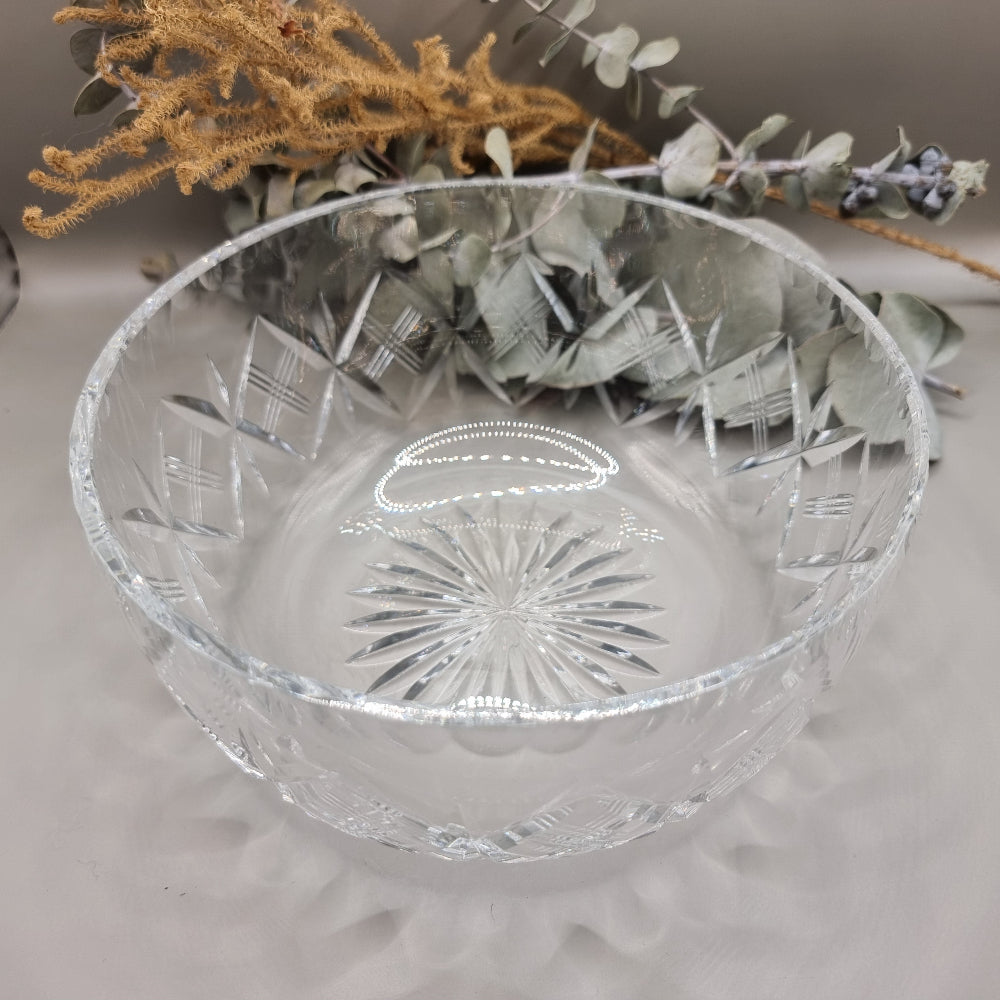 Deep pressed glass bowl with crosshatch pattern and starburst base