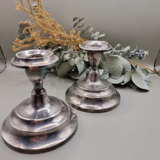 Pair of vintage silver candle holders with beaded detail