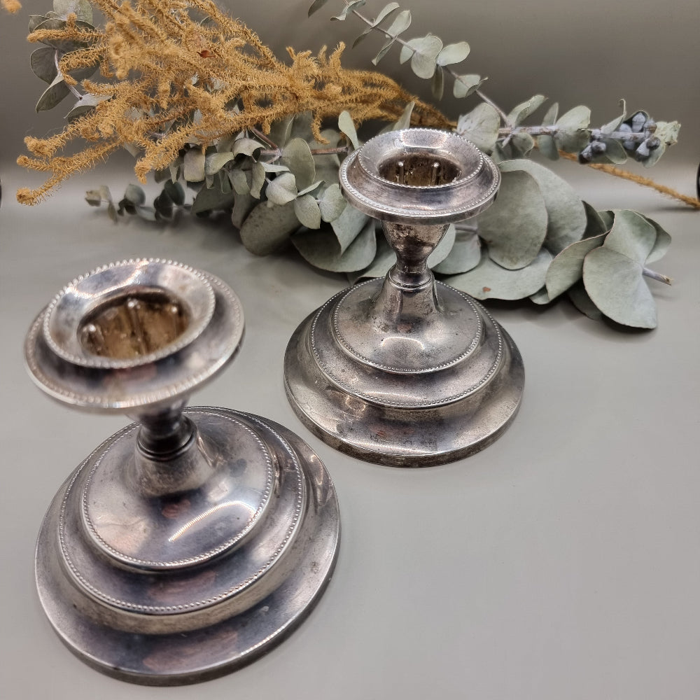 Pair of vintage silver candle holders with beaded detail