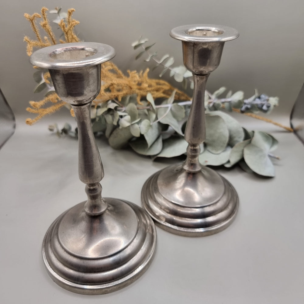 Pair of tall vintage silver candle holders with tapered stems