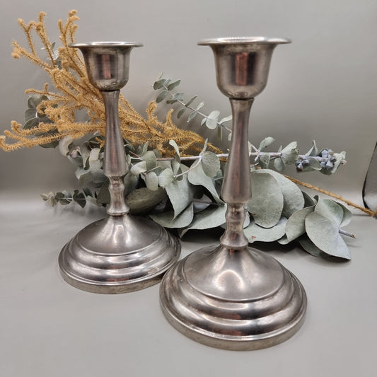 Pair of tall vintage silver candle holders with tapered stems