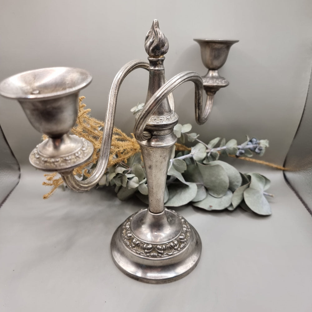 Vintage silver-plated 2 arm candelabra with ornate base and flame finial