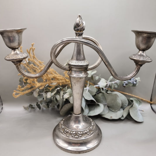 Vintage silver-plated 2 arm candelabra with ornate base and flame finial