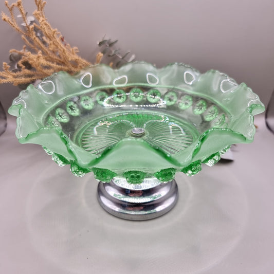 Vintage green glass pedestal bowl with scalloped rim and pressed design