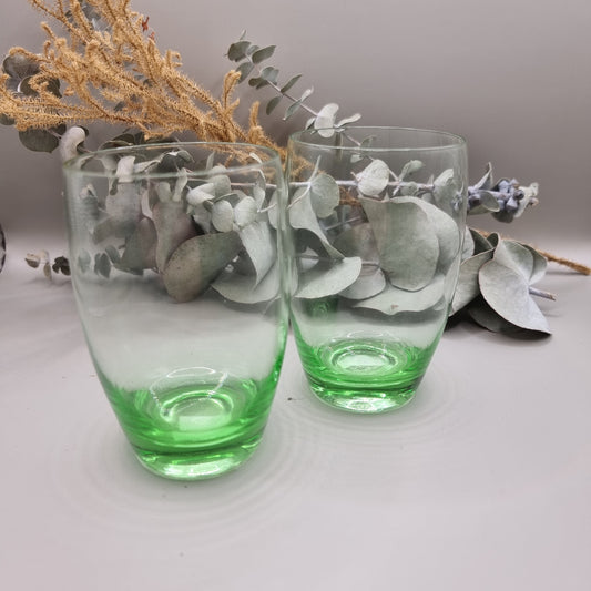 Pair of vintage green glass tumblers with rounded shape and green tint