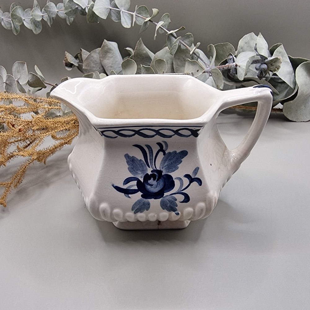 William Adams & Sons 'Baltic' blue and white creamer jug with floral design and scalloped spout.