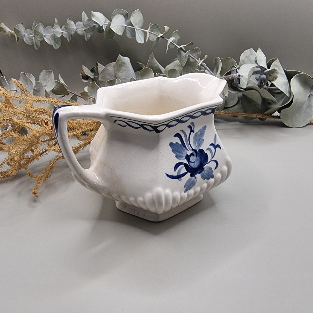 William Adams & Sons 'Baltic' blue and white creamer jug with floral design and scalloped spout.