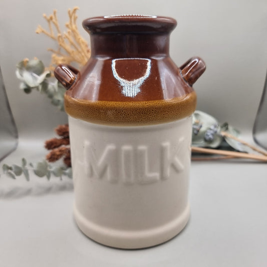 Vintage brown and white stoneware milk jug