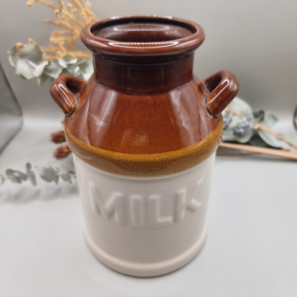Vintage brown and white stoneware milk jug