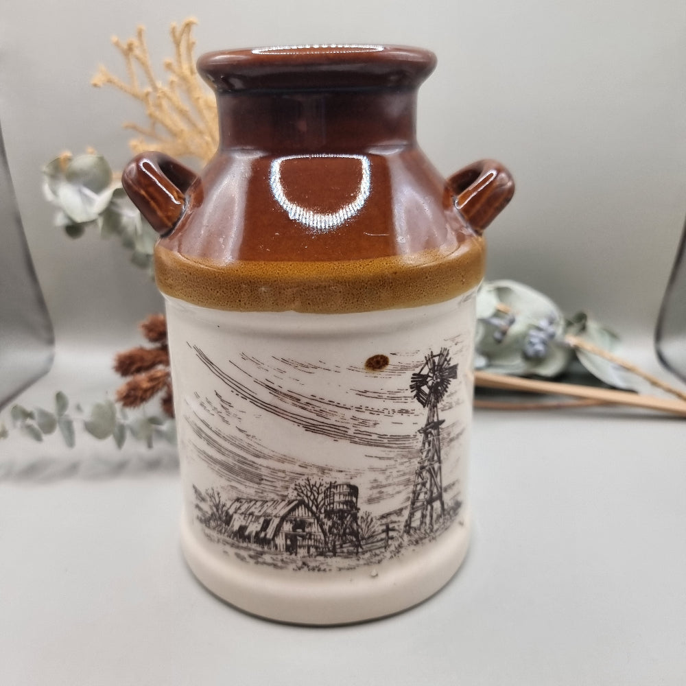 Vintage brown and white stoneware milk jug