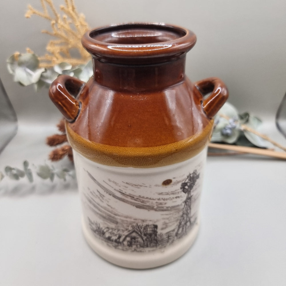 Vintage brown and white stoneware milk jug