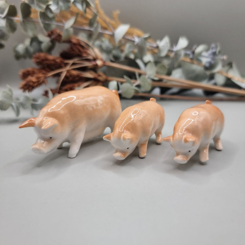 Vintage Japanese porcelain miniature pig set