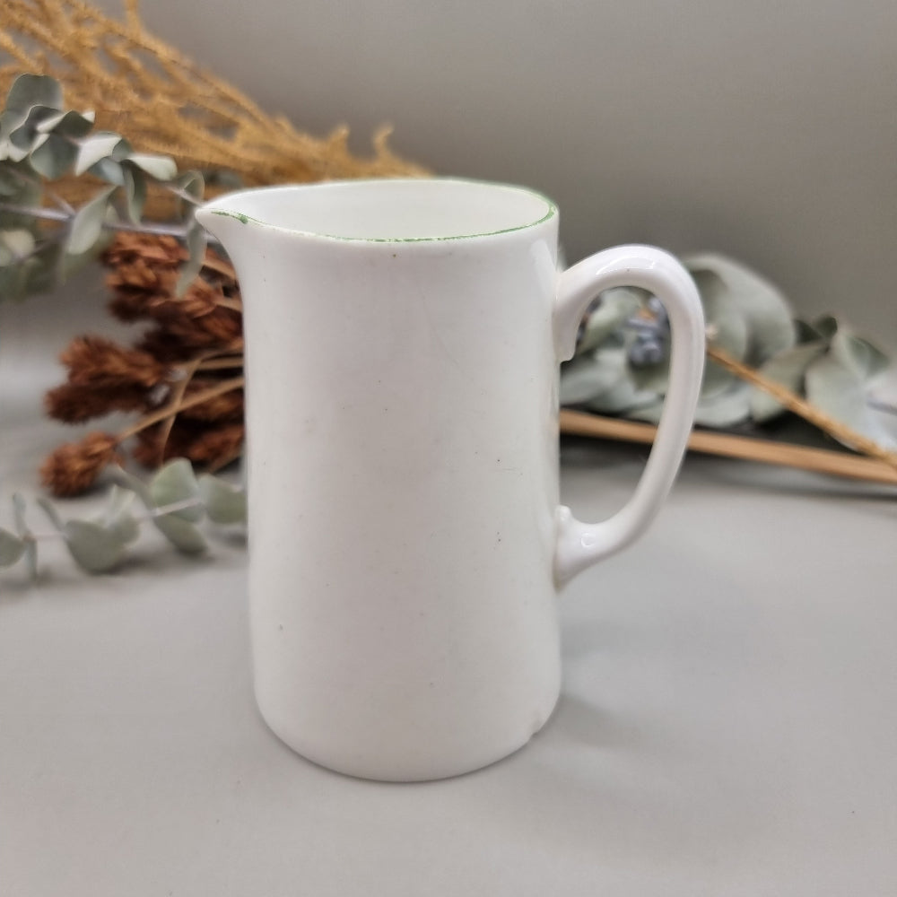 Porcelain creamer jug with green detail