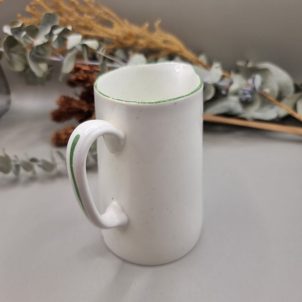 Porcelain creamer jug with green detail