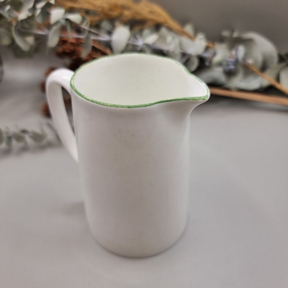 Porcelain creamer jug with green detail