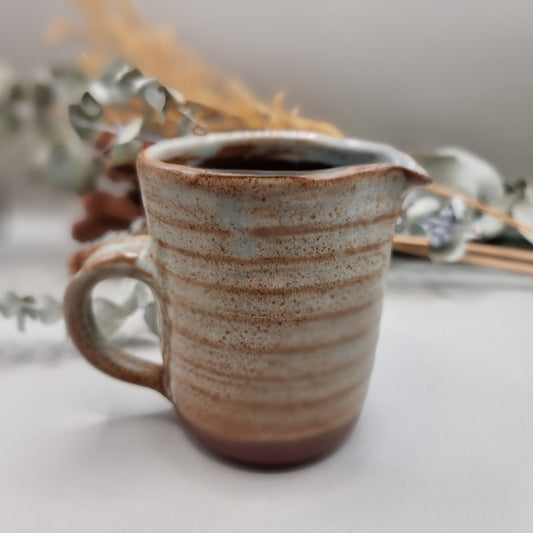 Studio pottery jug with ribbed detail