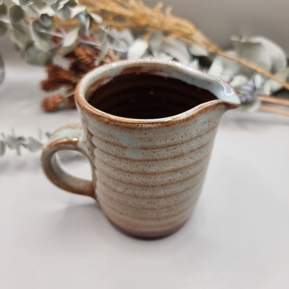 Studio pottery jug with ribbed detail