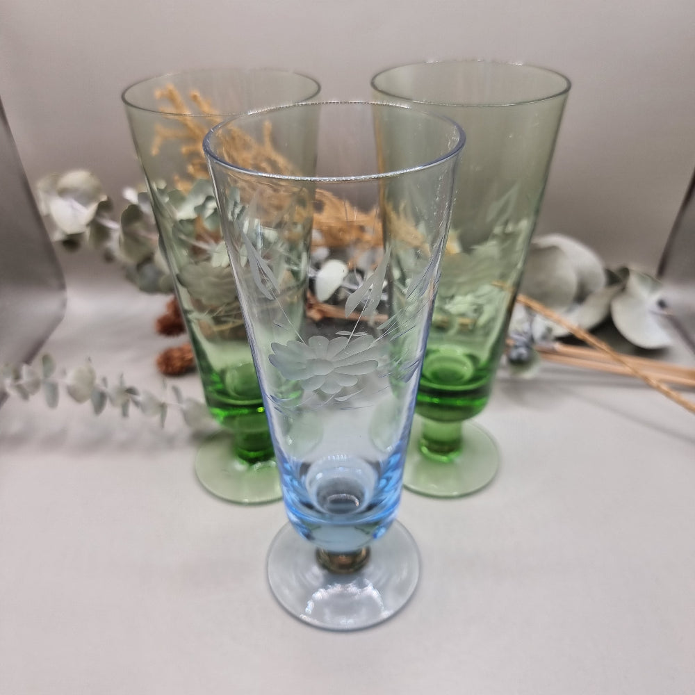 Set of 3 etched glass goblets in green and blue with floral design.