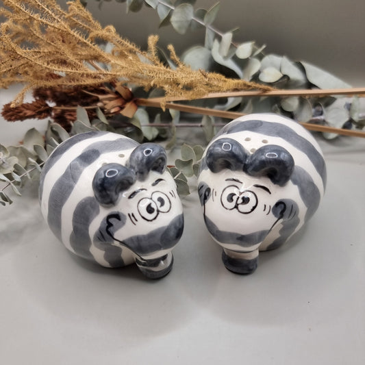 Charming cartoon style elephant salt and pepper shakers