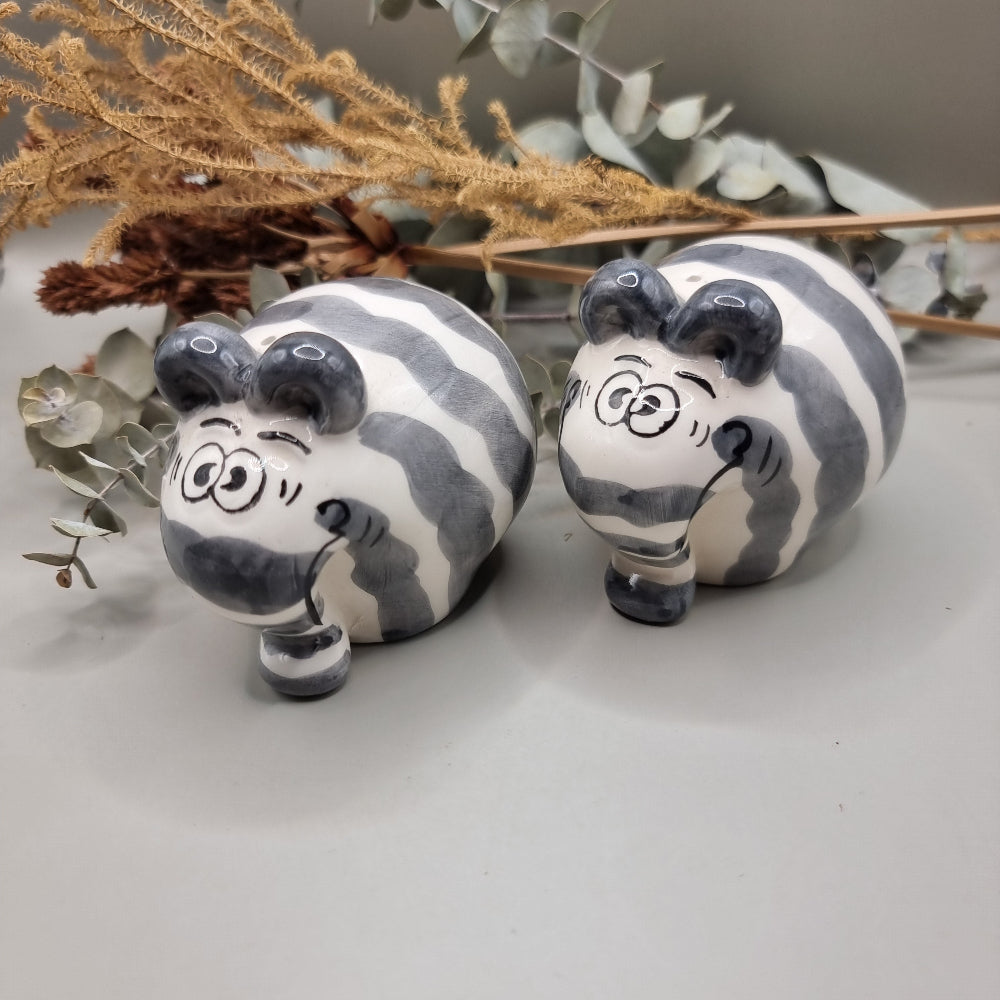 Charming cartoon style elephant salt and pepper shakers