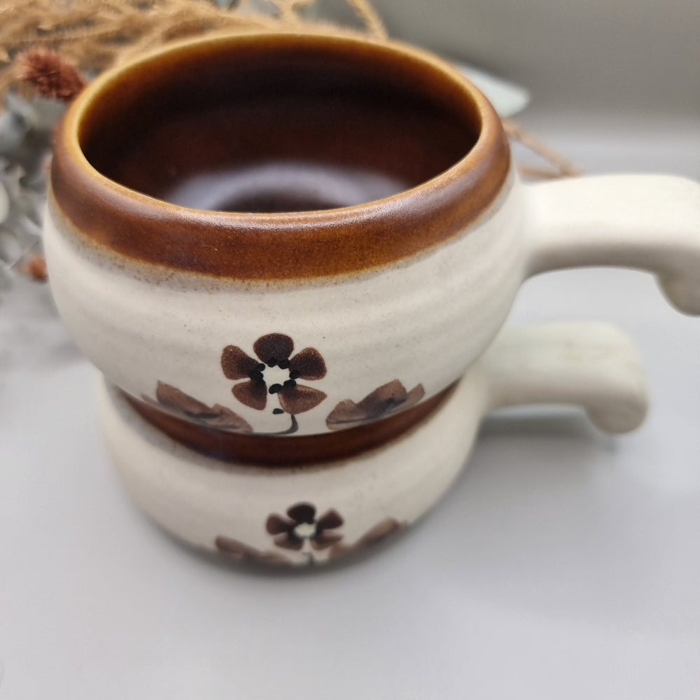 Set of 4 vintage soup bowls with brown rims and floral design.
