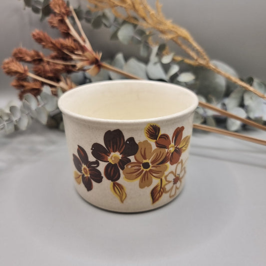 Vintage Australian pottery bowl with hand-painted brown and mustard floral design