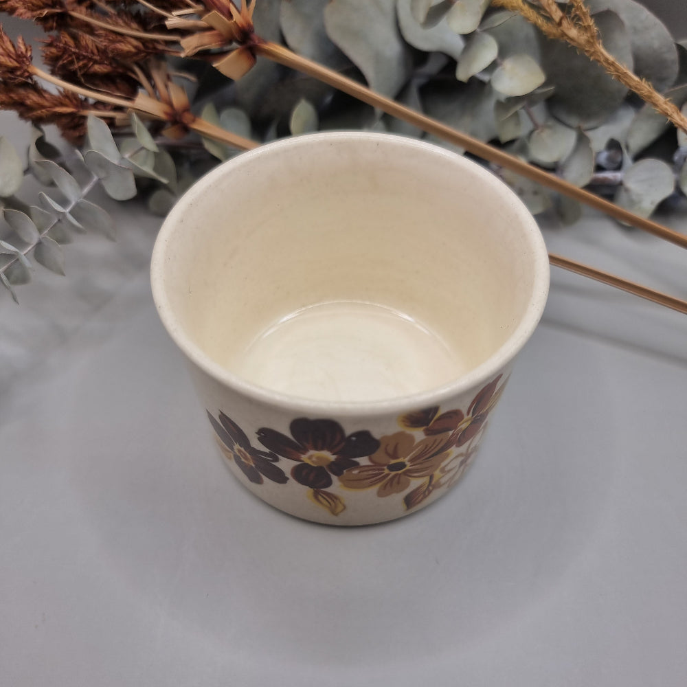 Vintage Australian pottery bowl with hand-painted brown and mustard floral design