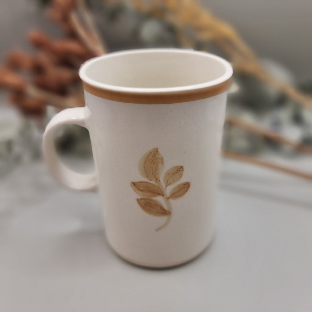 Jersey Pottery vintage mug with hand-painted brown floral design and white glaze
