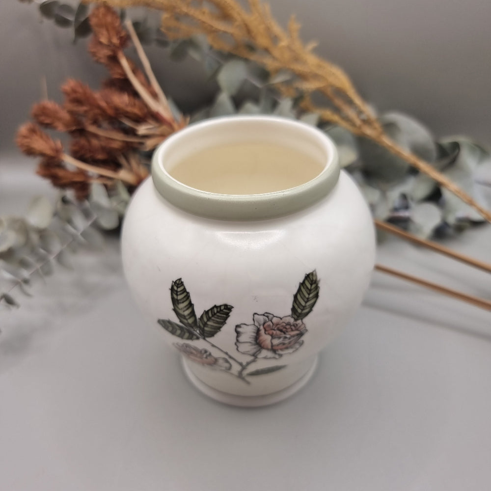 Crown Devon Fieldings vase 1244 with floral and leaf design on creamy ceramic base.