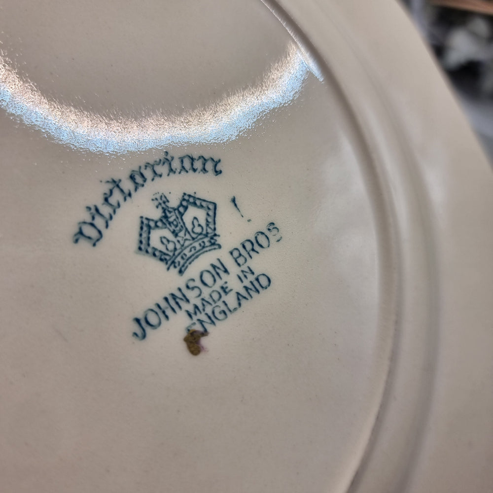 Johnson Bros Victorian square plate with floral centre and corner bouquets, gold edge and brown scroll detail.