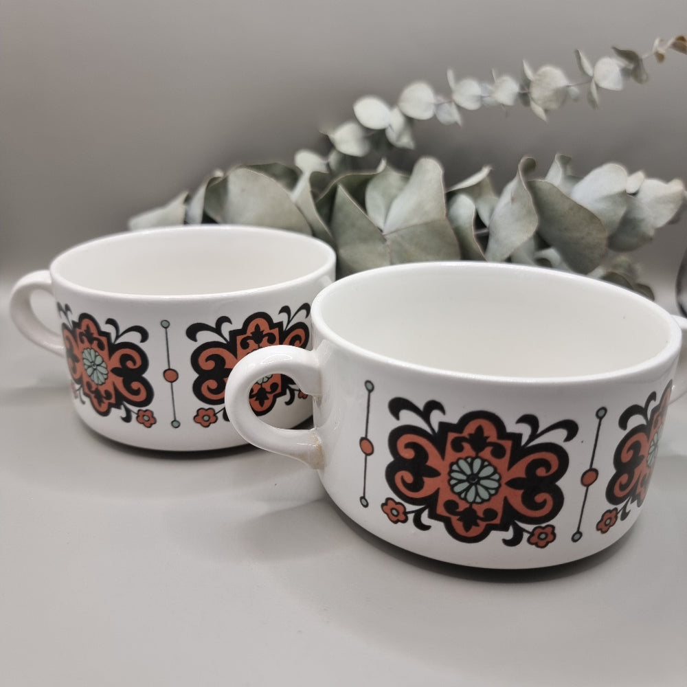 Set of 2 soup bowls with retro orange and brown floral pattern.