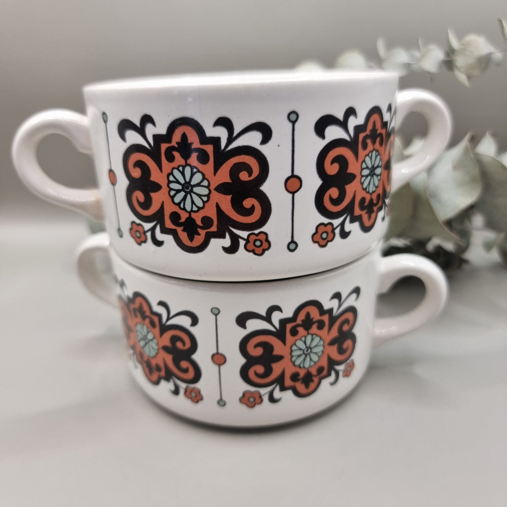 Set of 2 soup bowls with retro orange and brown floral pattern.