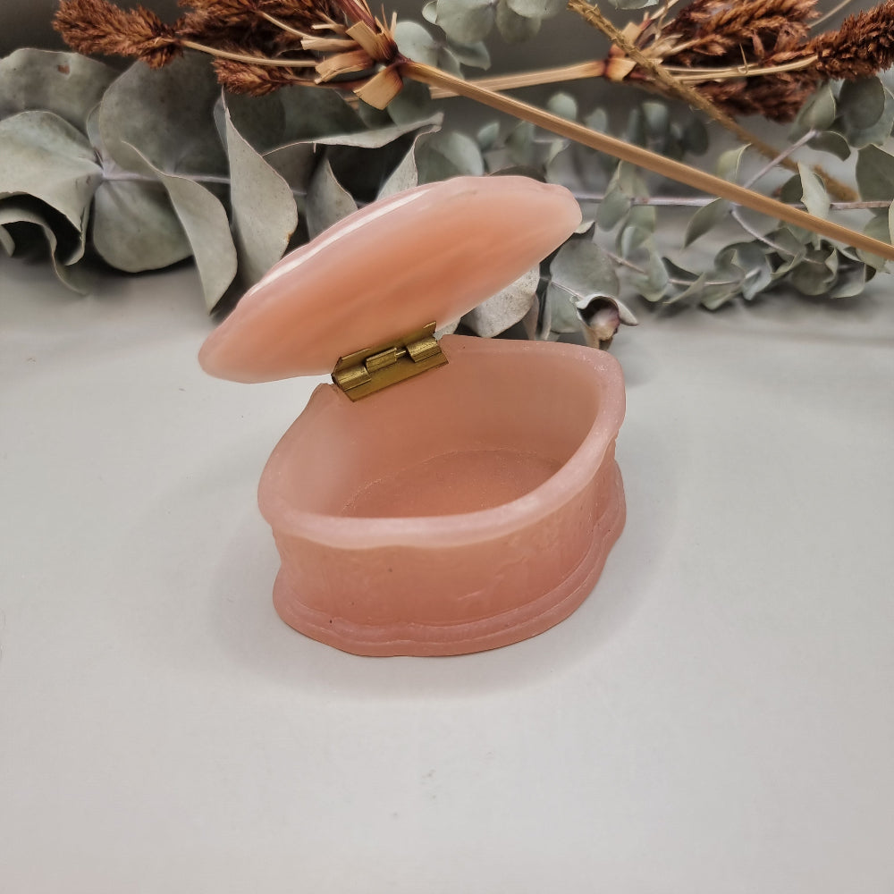 Pink vintage Marlestone trinket box with white classical cameo scene and hinged lid, made in New Zealand.