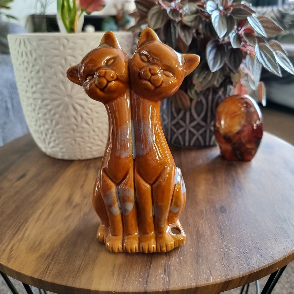 Vintage ceramic twin cat figurine in caramel glaze with soft grey accents, once a pen holder