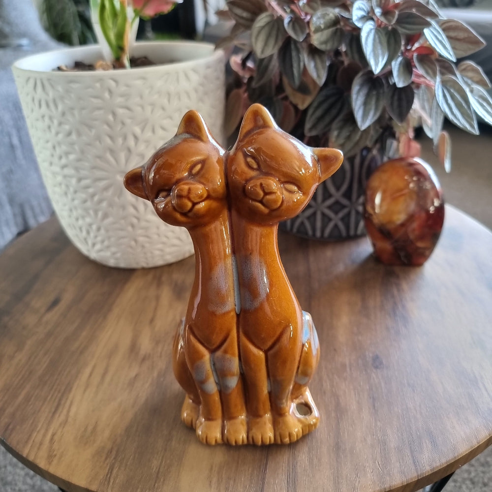 Vintage ceramic twin cat figurine in caramel glaze with soft grey accents, once a pen holder