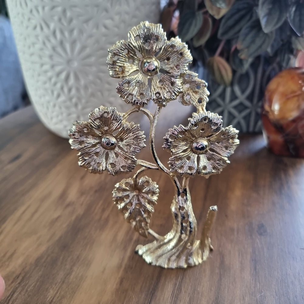 Vintage floral stud earring holder shaped like a blooming flower tree.