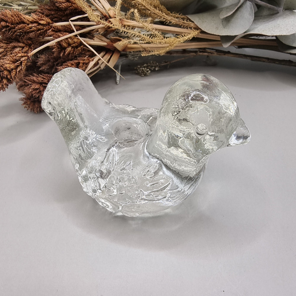 Clear glass bird candle holder with textured detailing