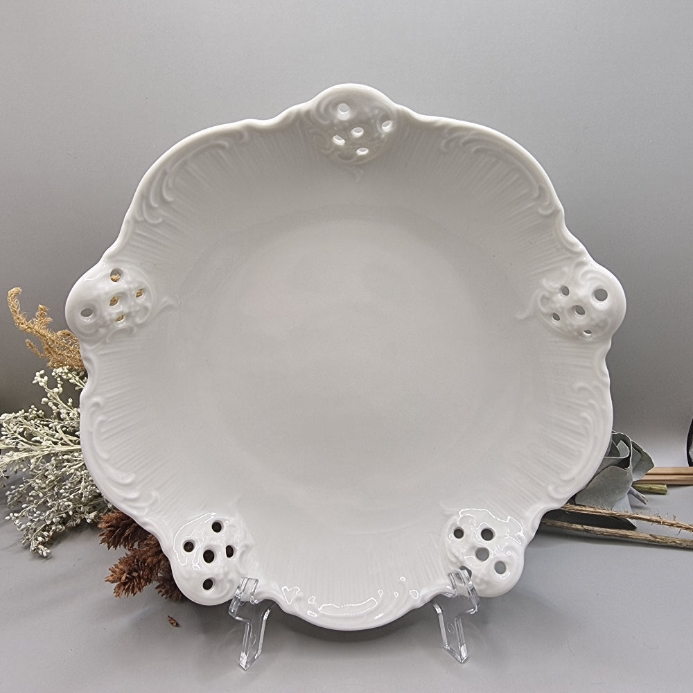 White Rosenthal Classic Rose porcelain dish with pierced edge and embossed scroll detail, made in Germany.